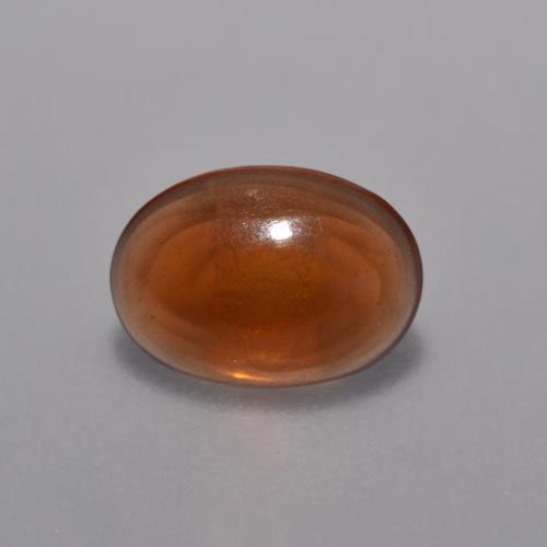 Opale chocolat orange naturelle coupe ovale, 0,36 ct, transparent