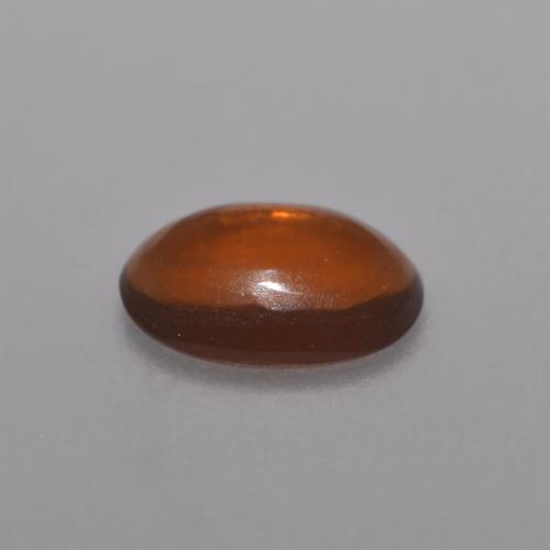 Opale chocolat orange naturelle coupe ovale, 0,36 ct, transparent