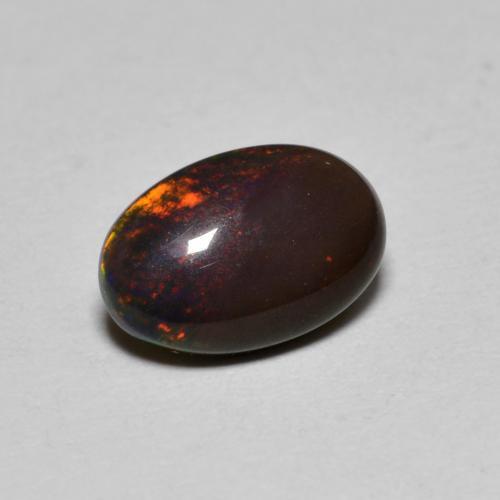 Opale chocolat multicolore naturelle coupe ovale, 0,80 ct, translucide