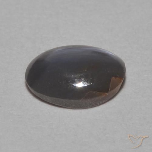 Oeil de Chat Chrysobéryl Gris moyen naturelle ovale, 0.62 ct, Opaque