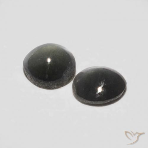 Shop natural 0.36ct Noir grisâtre Oeil de Chat Chrysobéryl gems, ovale, from Sri Lanka at GemSelect. In stock, global shipping!