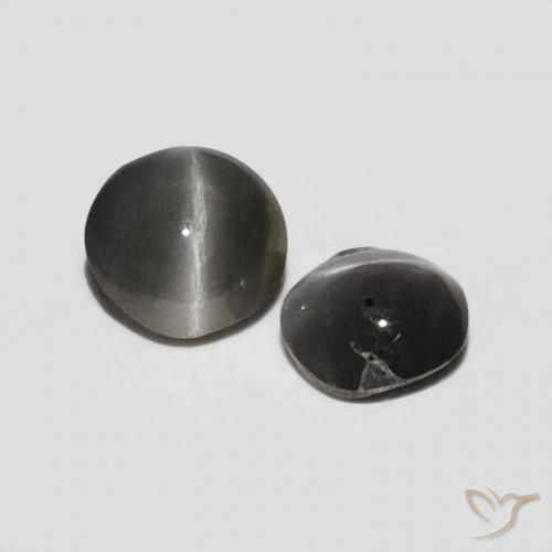Shop natural 0.30ct Noir grisâtre Oeil de Chat Chrysobéryl gems, ovale, from Sri Lanka at GemSelect. In stock, global shipping!