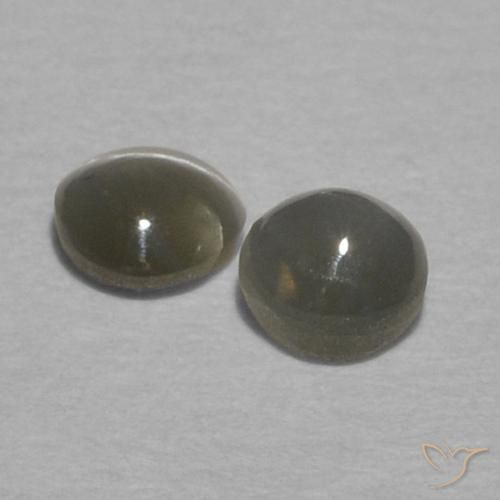 Shop natural 0.37ct Noir grisâtre Oeil de Chat Chrysobéryl gems, Tour, from Sri Lanka at GemSelect. In stock, global shipping!