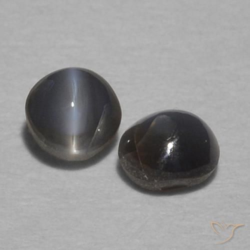 Shop natural 0.40ct Gris foncé Oeil de Chat Chrysobéryl gems, Tour, from Sri Lanka at GemSelect. In stock, global shipping!