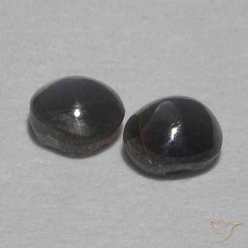 Shop natural 0.40ct Gris foncé Oeil de Chat Chrysobéryl gems, Tour, from Sri Lanka at GemSelect. In stock, global shipping!