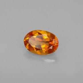 Clinohumite Jaune orange naturelle Coupe ovale, 0.48 ct, VS