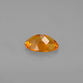 Clinohumite orange naturelle coupe ovale, 0,67 ct, VS