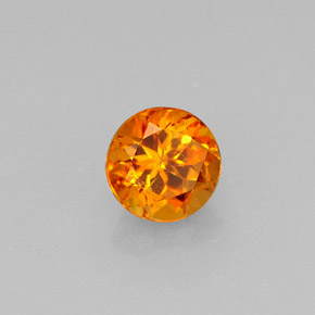 Clinohumite orange naturelle coupe roude, 0,64 ct, VS