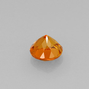 Clinohumite orange naturelle coupe roude, 0,64 ct, VS