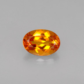 Clinohumite Jaune orange naturelle Coupe ovale, 0.56 ct, VS