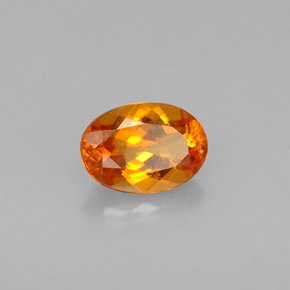 Clinohumite Jaune orange naturelle Coupe ovale, 0.56 ct, VS