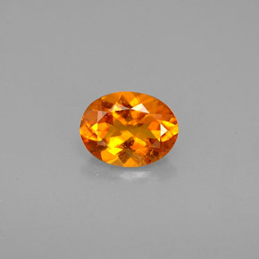 Clinohumite Jaune orange naturelle Coupe ovale, 0.60 ct, VS-SI
