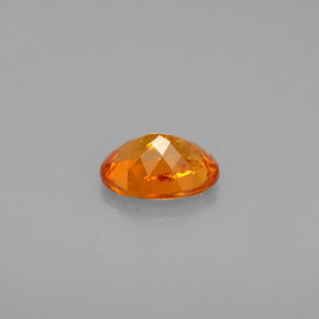 Clinohumite Jaune orange naturelle Coupe ovale, 0.60 ct, VS-SI