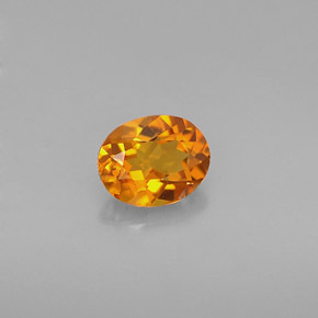 Clinohumite orange naturelle coupe ovale, 0,54 ct, VVS-VS