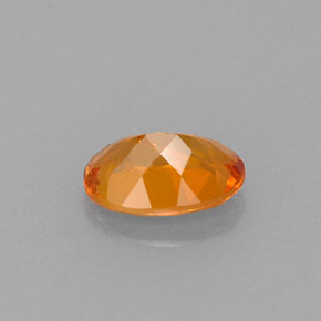 Clinohumite Jaune orange naturelle Coupe ovale, 0.66 ct, VS-SI