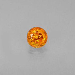 Clinohumite orange naturelle coupe roude, 0,43 ct, VS