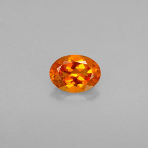 Clinohumite Jaune orange naturelle Coupe ovale, 0.50 ct, VS