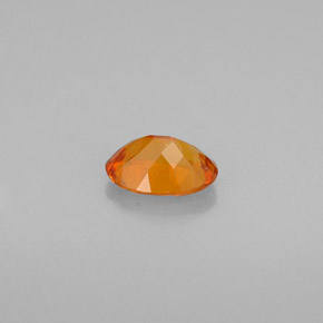 Clinohumite Jaune orange naturelle Coupe ovale, 0.50 ct, VS