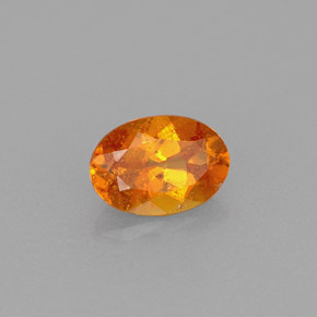 Clinohumite orange naturelle coupe ovale, 0,56 ct, VS-SI