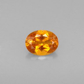 Clinohumite orange naturelle coupe ovale, 0,57 ct, VS-SI