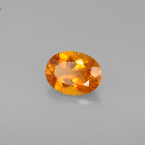 Clinohumite orange naturelle coupe ovale, 0,57 ct, VS-SI
