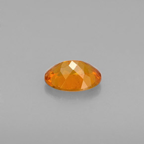 Clinohumite orange naturelle coupe ovale, 0,57 ct, VS-SI