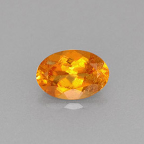 Clinohumite orange naturelle coupe ovale, 0,61 ct, VS-SI