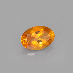 Clinohumite orange naturelle coupe ovale, 0,61 ct, VS-SI