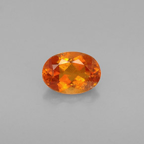 Clinohumite Jaune orange naturelle Coupe ovale, 0.64 ct, VS-SI