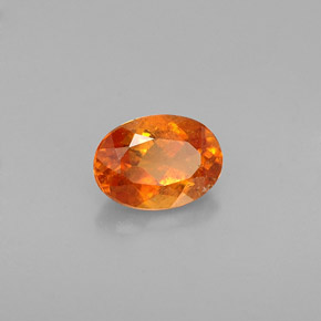Clinohumite Jaune orange naturelle Coupe ovale, 0.64 ct, VS-SI
