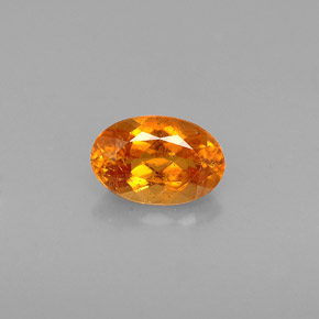 Clinohumite Jaune orange naturelle Coupe ovale, 0.64 ct, VS-SI