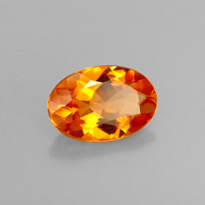 Clinohumite orange naturelle coupe ovale, 0,58 ct, VS