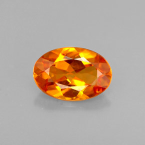Clinohumite orange naturelle coupe ovale, 0,58 ct, VS