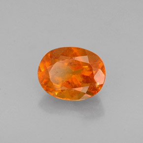 Clinohumite orange naturelle coupe ovale, 0,72 ct, VS-SI