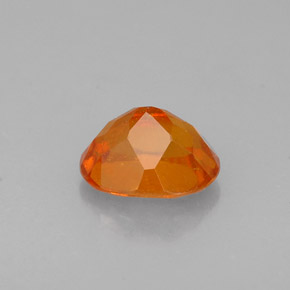 Clinohumite orange naturelle coupe ovale, 0,72 ct, VS-SI