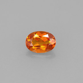 Clinohumite orange naturelle coupe ovale, 0,55 ct, VVS-VS