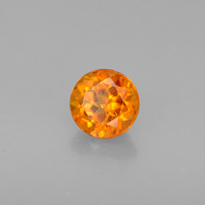 Clinohumite Jaune orange naturelle Coupe roude, 0.46 ct, VS