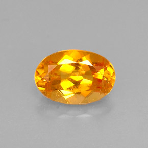 Clinohumite orange naturelle coupe ovale, 0,52 ct, VS
