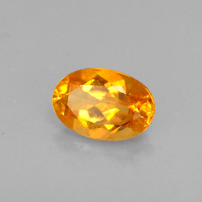 Clinohumite orange naturelle coupe ovale, 0,52 ct, VS