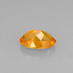 Clinohumite orange naturelle coupe ovale, 0,52 ct, VS