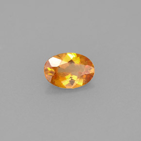 Clinohumite orange naturelle coupe ovale, 0,42 ct, VS