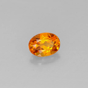 Clinohumite orange naturelle coupe ovale, 0,44 ct, VS