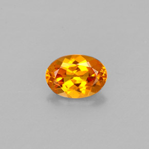 Clinohumite Jaune orange naturelle Coupe ovale, 0.47 ct, VS
