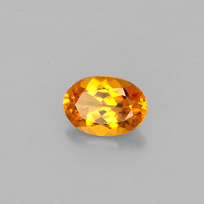 Clinohumite Jaune orange naturelle Coupe ovale, 0.47 ct, VS