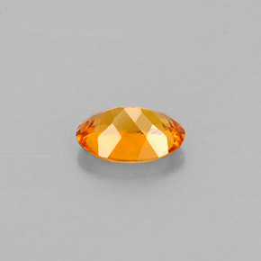 Clinohumite Jaune orange naturelle Coupe ovale, 0.47 ct, VS