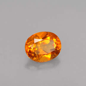 Clinohumite orange naturelle coupe ovale, 0,48 ct, VVS-VS