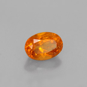 Clinohumite orange naturelle coupe ovale, 0,52 ct, VS-SI