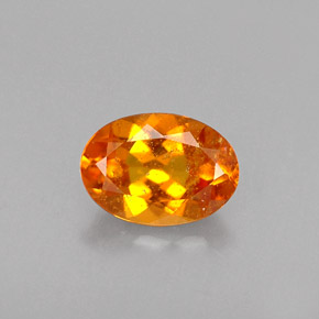 Clinohumite Jaune orange naturelle Coupe ovale, 0.46 ct, VS-SI