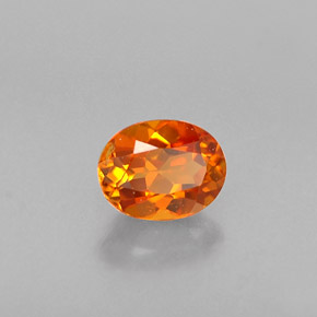 Clinohumite orange naturelle coupe ovale, 0,36 ct, VS