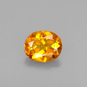 Clinohumite Jaune orange naturelle Coupe ovale, 0.41 ct, VS